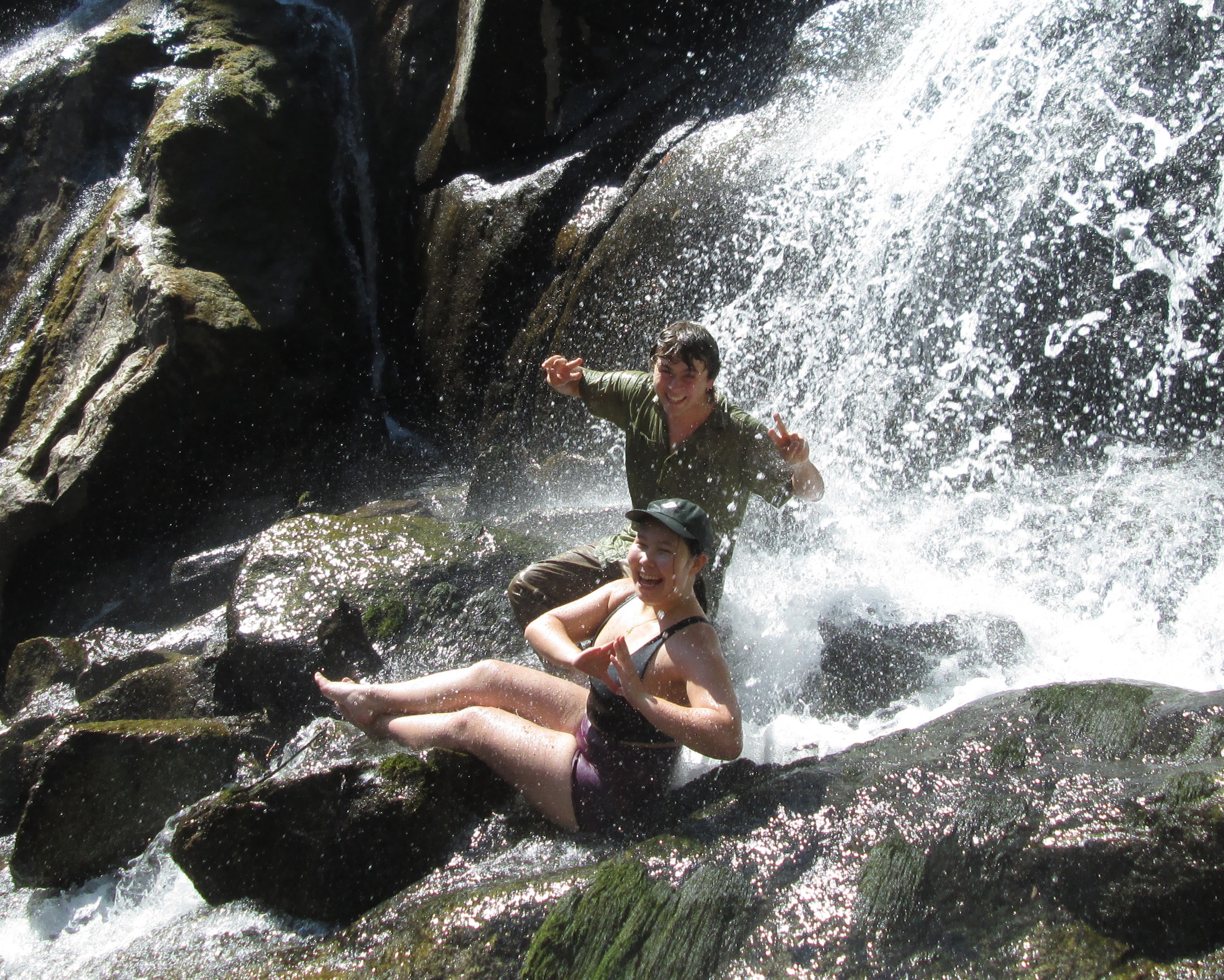 Mason and Elizabeth in a waterfall